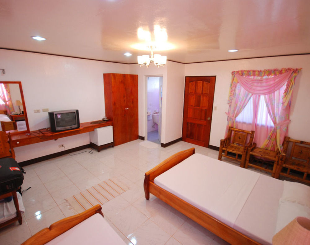 Reddoorz Premium @ Flower Beach Anda Exterior foto