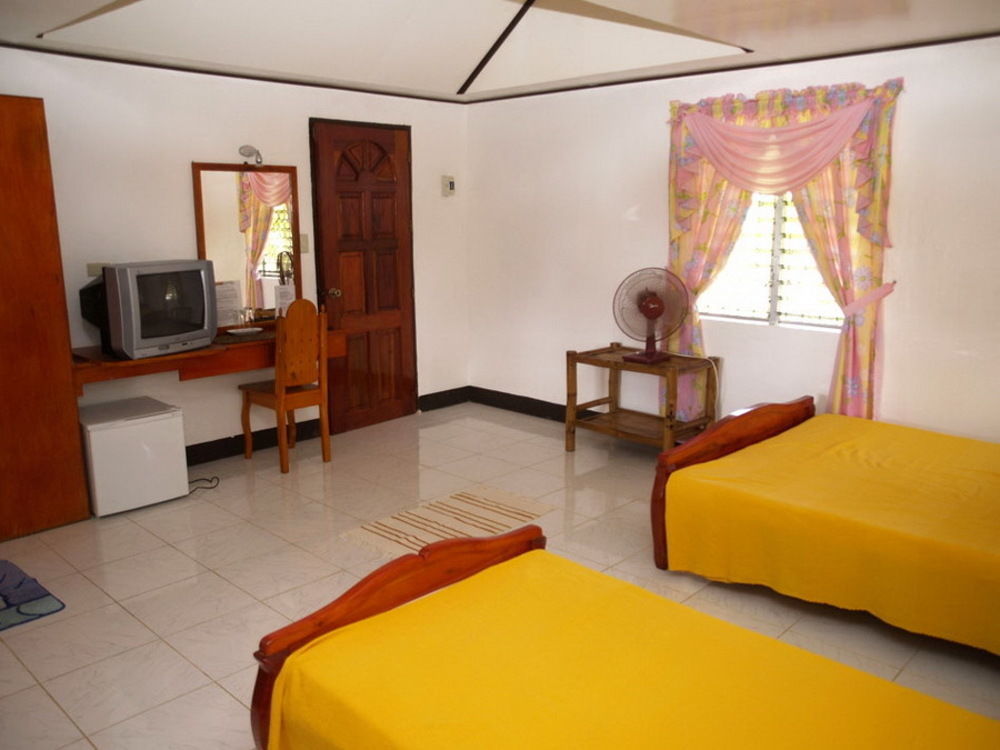 Reddoorz Premium @ Flower Beach Anda Exterior foto